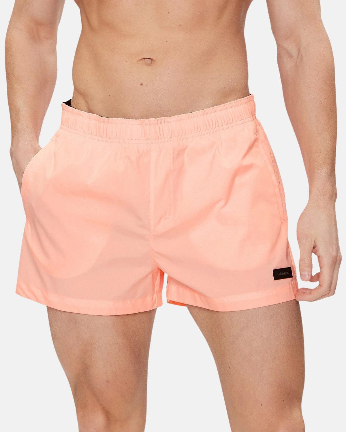 CALVIN KLEIN TAG LOGO SWIM SHORTS PINK | Studio DOS